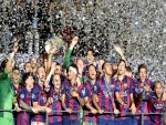 Jugadores del Fútbol Club Barcelona alzando la Copa de Europa 2015