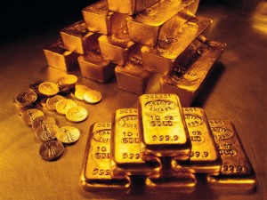 Monedas y lingotes de oro