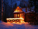Casa iluminada en invierno