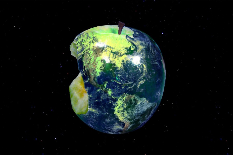 El planeta Tierra con forma de una manzana verde mordida