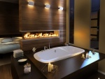 Romántico cuarto de baño con velas y fuego de chimenea