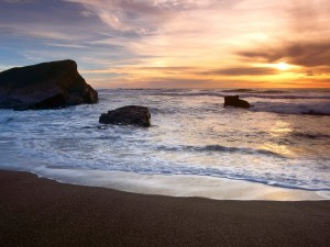 Postal: Amanecer en la playa