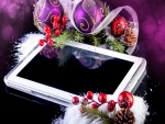 Tablet con adornos navideños