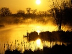 Sol reflejado en la laguna