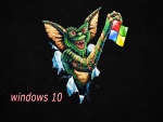 Gremlin sosteniendo el logo de Windows