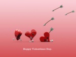 Flechas de amor alcanzando a los corazones en el Día de San Valentín