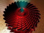 Tubos de color rojo formando un espiral con un halo de luz en el centro