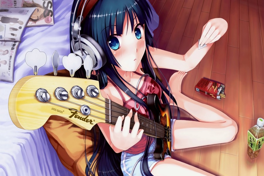 Chica anime tocando la guitarra